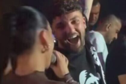 Kjo video po ‘çmend’ rrjetin, Olsi Bylyku shfaqet në koncert me Egli Takon? Ja e vërteta